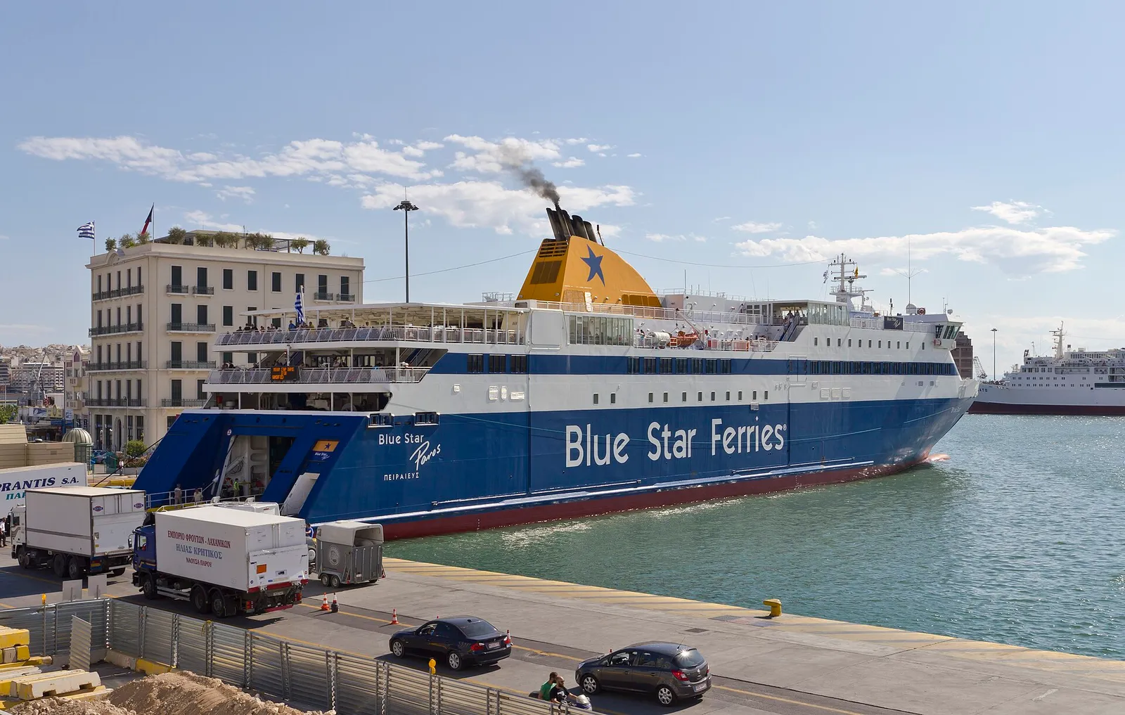 Ferries lined up along the waterfront at Piraeus port near Athens
