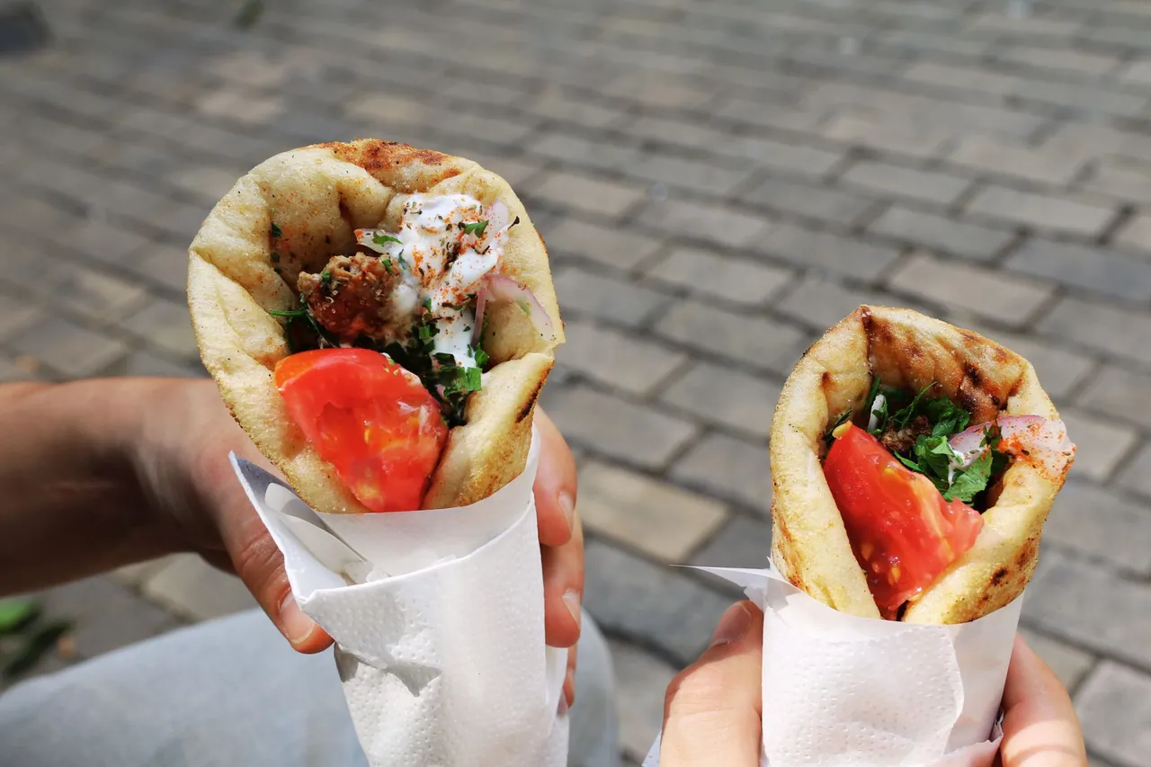 Souvlaki wrap with pita and chips, classic Athens street food in Greece