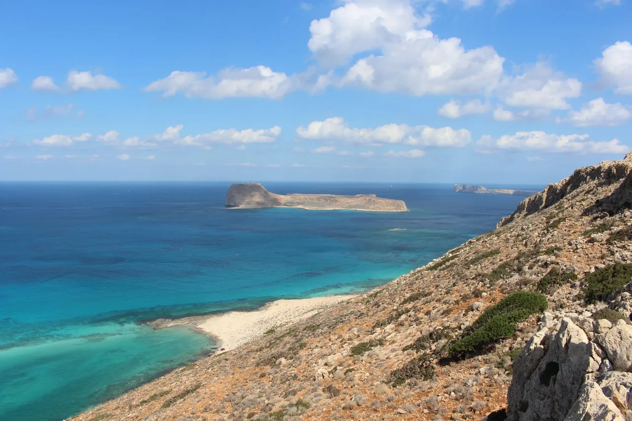 View over Balos lagoon from the footpath in Crete, Greece, with the pale sand and islet below