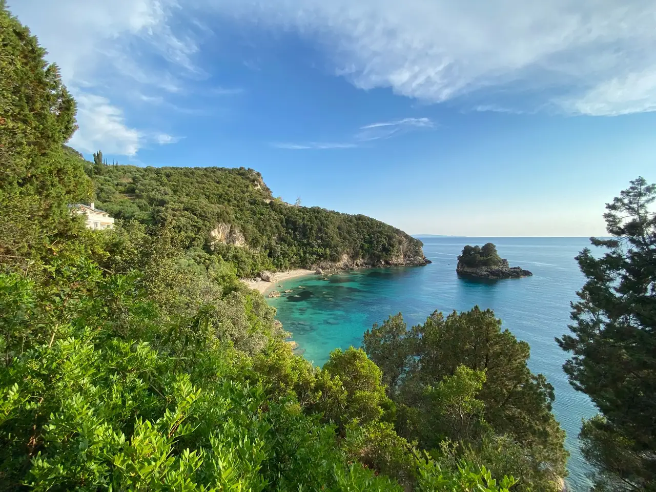 The green headlands and clear coves of Paleokastritsa on the west coast of Corfu, Greece