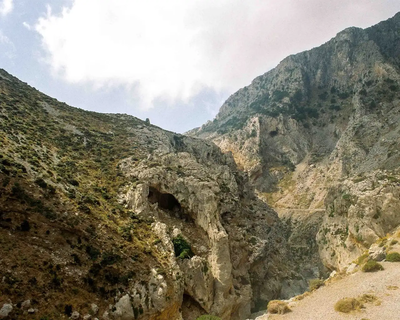 Hikers walking through the Samaria gorge in the White Mountains of Crete, Greece