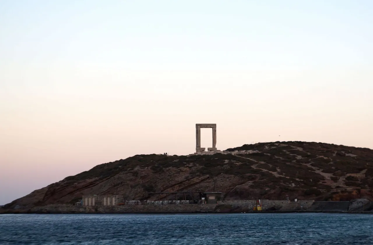 The Portara marble gateway on Naxos island in the Cyclades, Greece