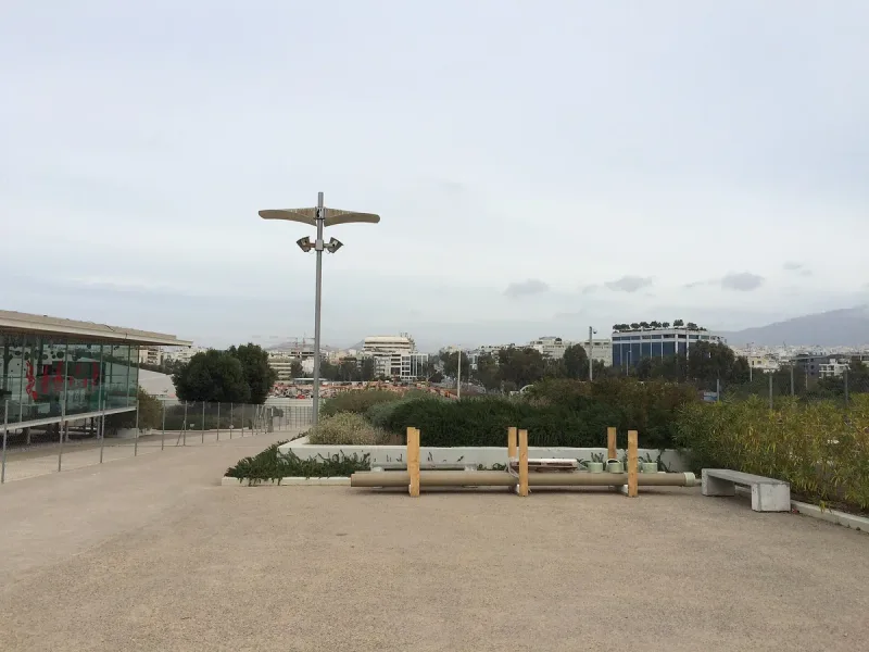 The plaza at the Stavros Niarchos Foundation Cultural Center in Athens, with the canopy behind
