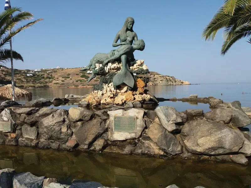 The mermaid memorial on the shore at Kini on Syros, facing the sea