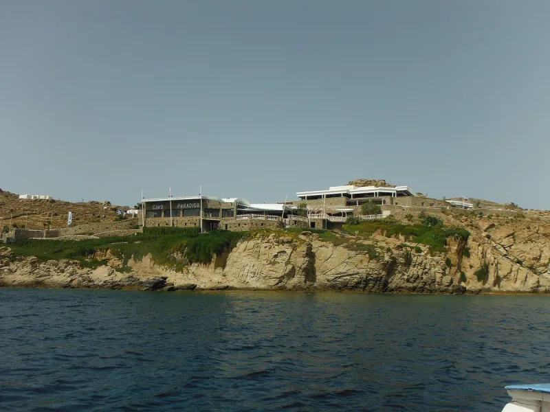 The Cavo Paradiso complex on the cliff above Paradise Beach on Mykonos, seen from the sea